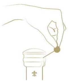 A golden icon of a hand demonstrating how to open a decanter