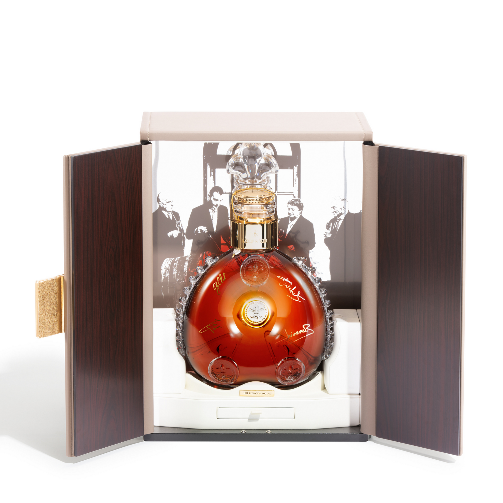 A packshot of LOUIS XIII Legacy decanter in an open packaging box